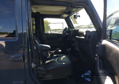 2017 Jeep Wrangler Unlimited Smoky Mountain 4X4 из США, поврежденный, VIN 1C4HJWEG2HL633800